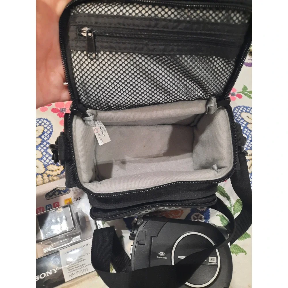 Sony Handycam DCR-DVD650 Camcorder 60x Zoom Bundle with New NP-FV100 Battery